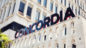 Close up photo of the 'Concordia' text sign outside the university's Henry F. Hall Building in Montreal, Quebec