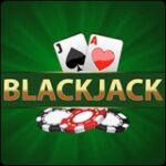 Imagen de Blackjack con cartas J de espadas y A de corazones sobre un fondo verde