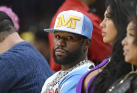 Boxer Floyd Mayweather Jr., shown here after retirement attending an NBA basketball game, has signed a partnership deal with Games Global for the development of a slot game featuring his likeness.
