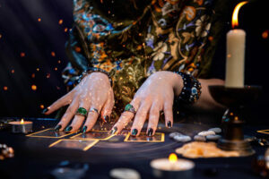 A fortune teller reads Tarot cards