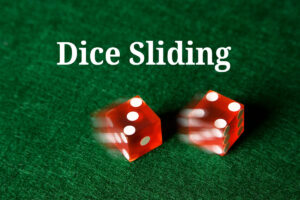 Four men have been charged with cheating at craps by sliding dice at the Cosmopolitan in Las Vegas.