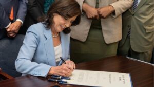 New York Governor Kathleen C. Hochul signs a bill into law