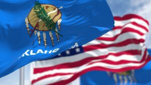 The Oklahoma flag bears a tribal symbol — an Osage warrior's shield