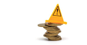 Financial Risk of Collapse, Unstable Pile of Coins