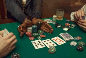 A poker table featuring multiple players