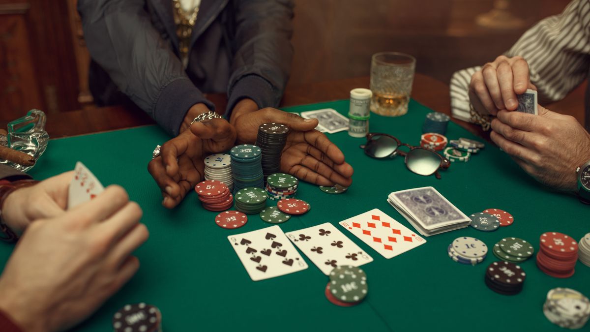A poker table featuring multiple players