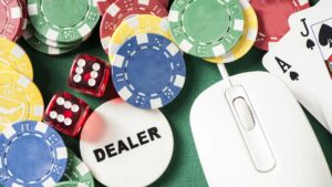 a collection of poker chips, dice and a mouse