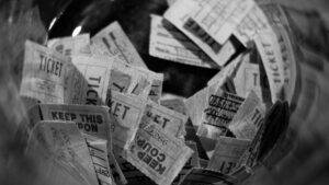 a collection of raffle tickets in a bowl