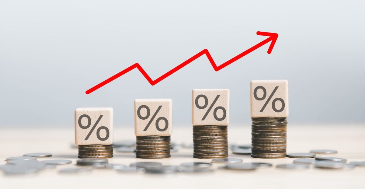 stacks of coins with percentage blocks on them, getting increasingly taller