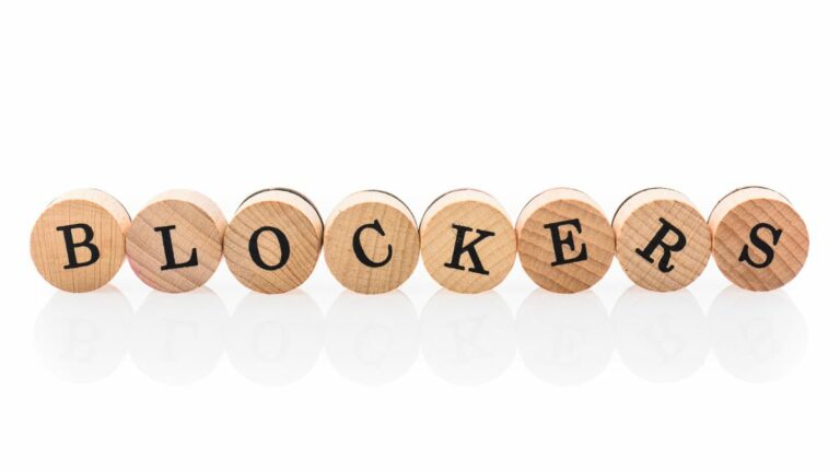 a set of wooden tiles spelling out blockers