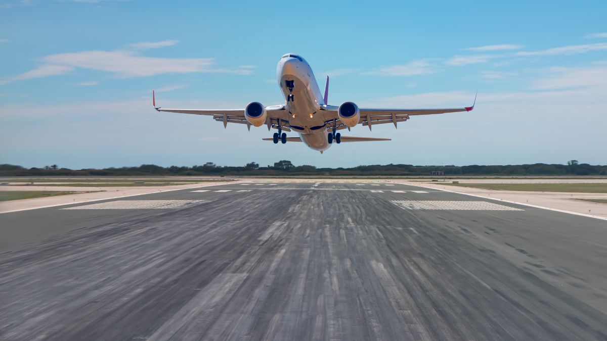 a plane taking off from a runway