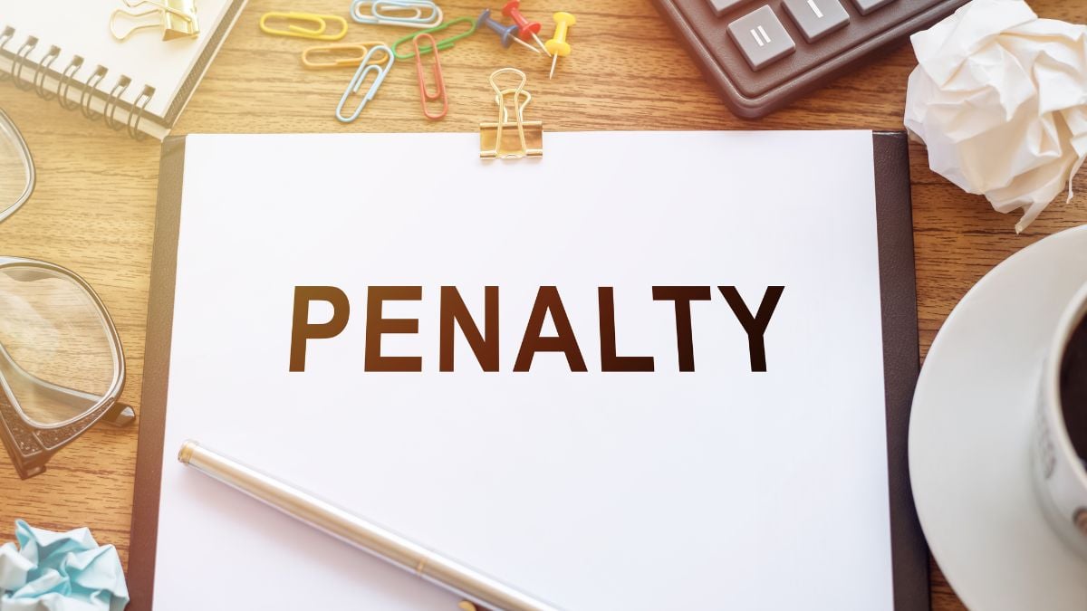 a law table full of different supplies that has a set of papers in the center with penalty written on the cover