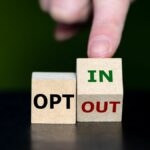 a finger pushing a block that reads in and out to a new position next to a block that reads opt