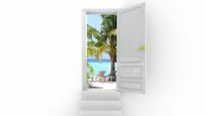 white stairs leading to open white door on a white background. Through door a tropical scene is visible: sun, sand, sea, palms, and beach chairs