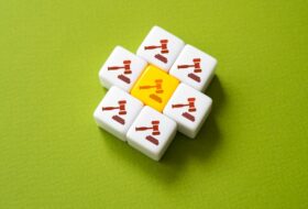 a series of tiles with gavels on them including a yellow one in the middle