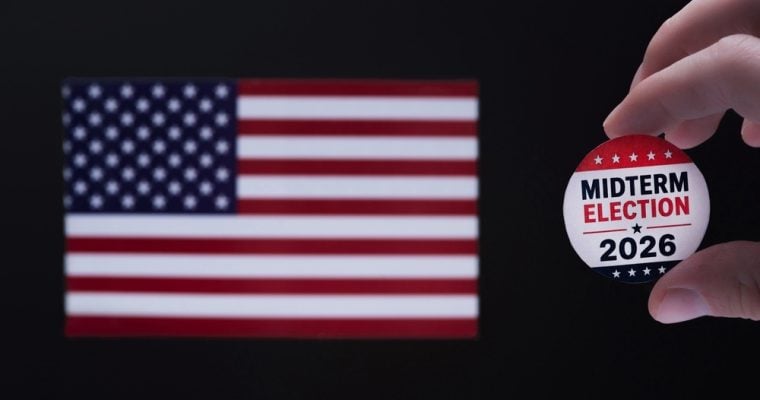 2026 American Midterm Elections sign in front of US flag