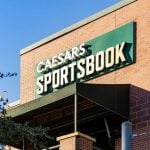 Caesars Sportsbook sign on a building