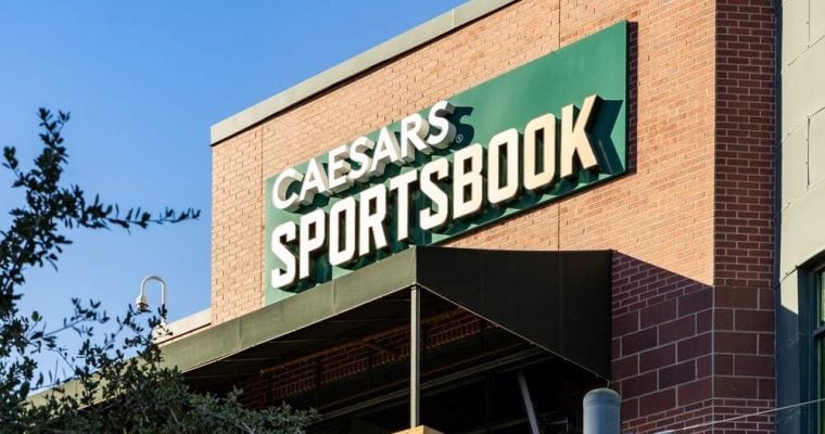 Caesars Sportsbook sign on a building