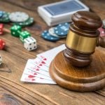 Judge gavel, card money chips, dices