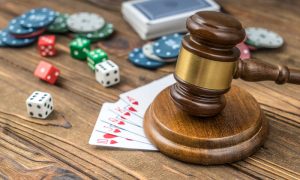 Judge gavel, card money chips, dices