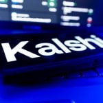 Kalshi Logo Displayed On Screen With Financial Charts And Trading Data