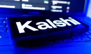 Kalshi Logo Displayed On Screen With Financial Charts And Trading Data