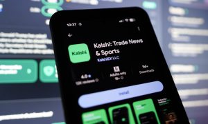 Kalshi Prediction Market Trading App Displayed On Smartphone With Live Event Contracts