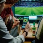 Legal sports betting on team in app on smartphone