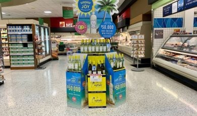Cupcake vineyards displaying and promoting summer of joy sauvignon blanc wine with a sweepstakes in Publix supermarket