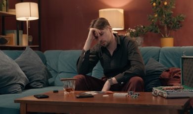 Disappointed broke man gambler takes empty wallet no money