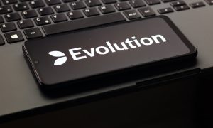 Evolution Gaming Group logo displayed on a smartphone screen