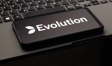 Evolution Gaming Group logo displayed on a smartphone screen