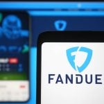 FanDuel logo of a sports betting company is seen on a mobile phone