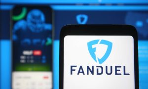 FanDuel logo of a sports betting company is seen on a mobile phone