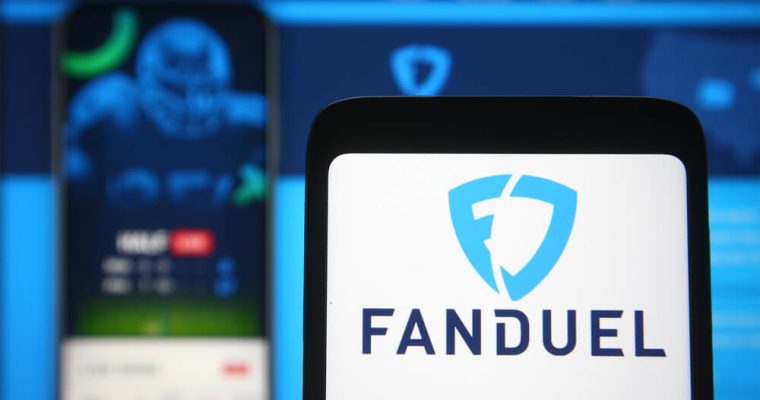 FanDuel logo of a sports betting company is seen on a mobile phone