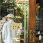 Small business startup, door with open sign