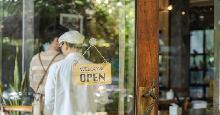 Small business startup, door with open sign