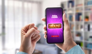 User winning jackpot on online casino app, online games and gambling concept