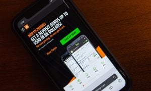 Website of DraftKings seen on iPhone screen