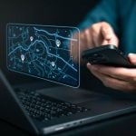 map on computer and phone with geolocation points