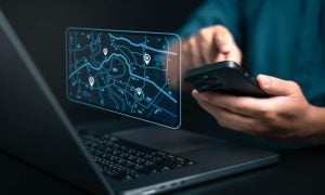 map on computer and phone with geolocation points