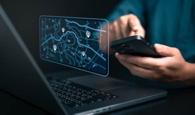 map on computer and phone with geolocation points