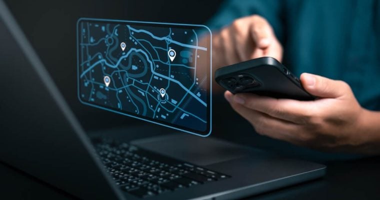 map on computer and phone with geolocation points