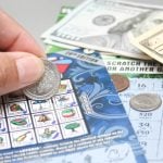 scratching lottery ticket in USA