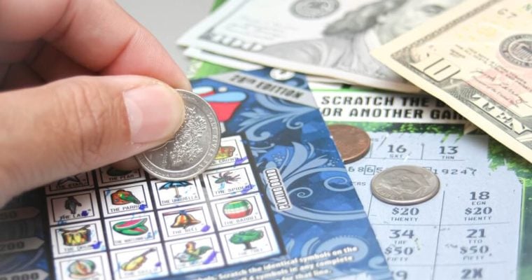 scratching lottery ticket in USA
