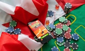 smartphone with sports betting, flag of Canada