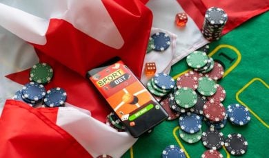 smartphone with sports betting, flag of Canada