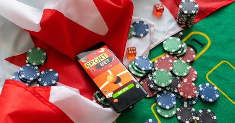 smartphone with sports betting, flag of Canada