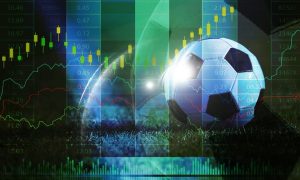 soccer ball on grass with financial stock market chart overlay, sports betting odds