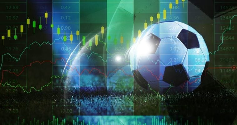 soccer ball on grass with financial stock market chart overlay, sports betting odds